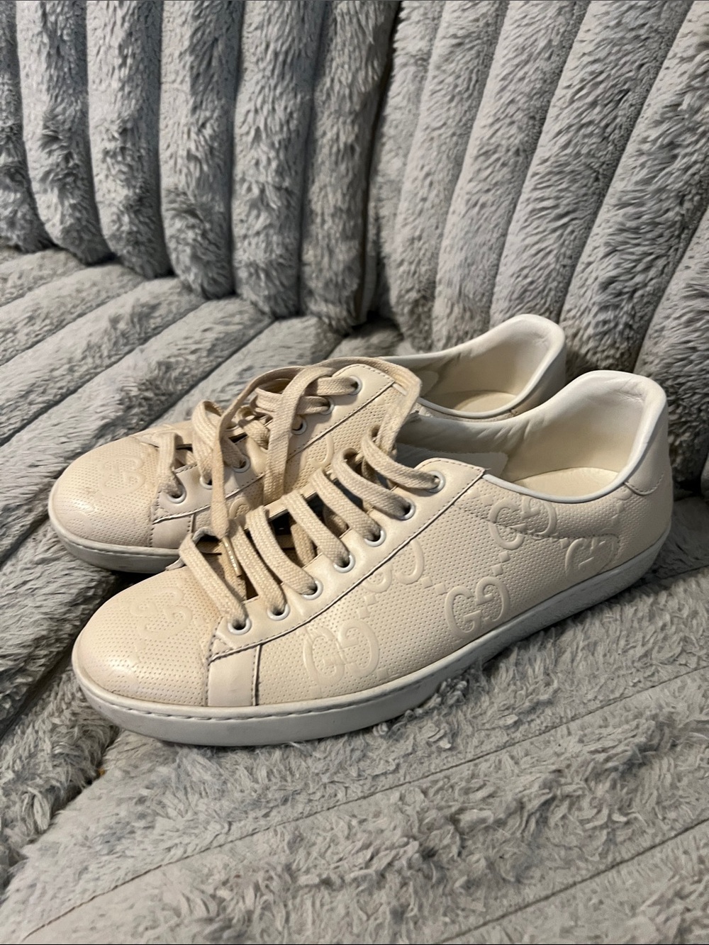 Gucci Off-White Embossed Logo Leather Sneakers